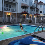 kids in swimming pool at the beach house at lake street in holland michigan