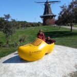 guests at the beach house at lake street enjoying the dutch heritage of holland michigan at windmill island