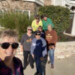 group enjoying their fall vacation in holland michigan at the beach house at lake street
