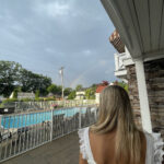 guest overlooking the pool and spa at the beach house at lake street in holland michigan